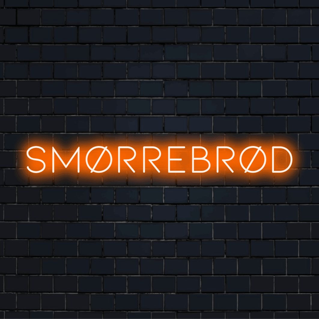 Sm Rrebr D Neon Sign, bright LED glow against black brick wall