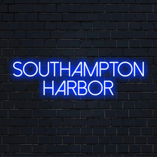 Southampton Harbor Neon Sign, neon text light on dark brick wall