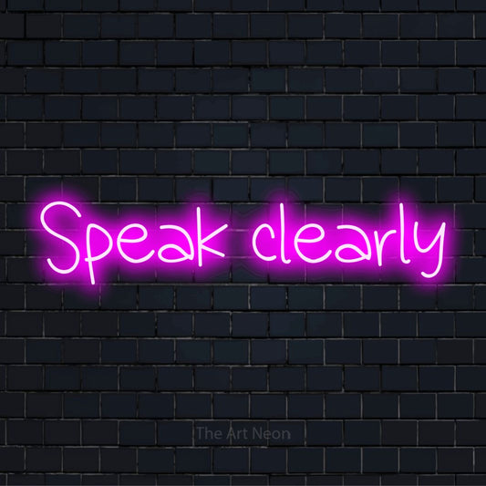 "Speak Clearly" text design with neon effect on a black brick wall