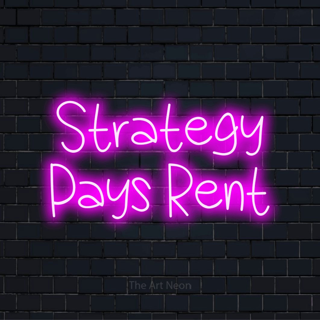 "Strategy Pays Rent" text design with neon effect on a black brick wall