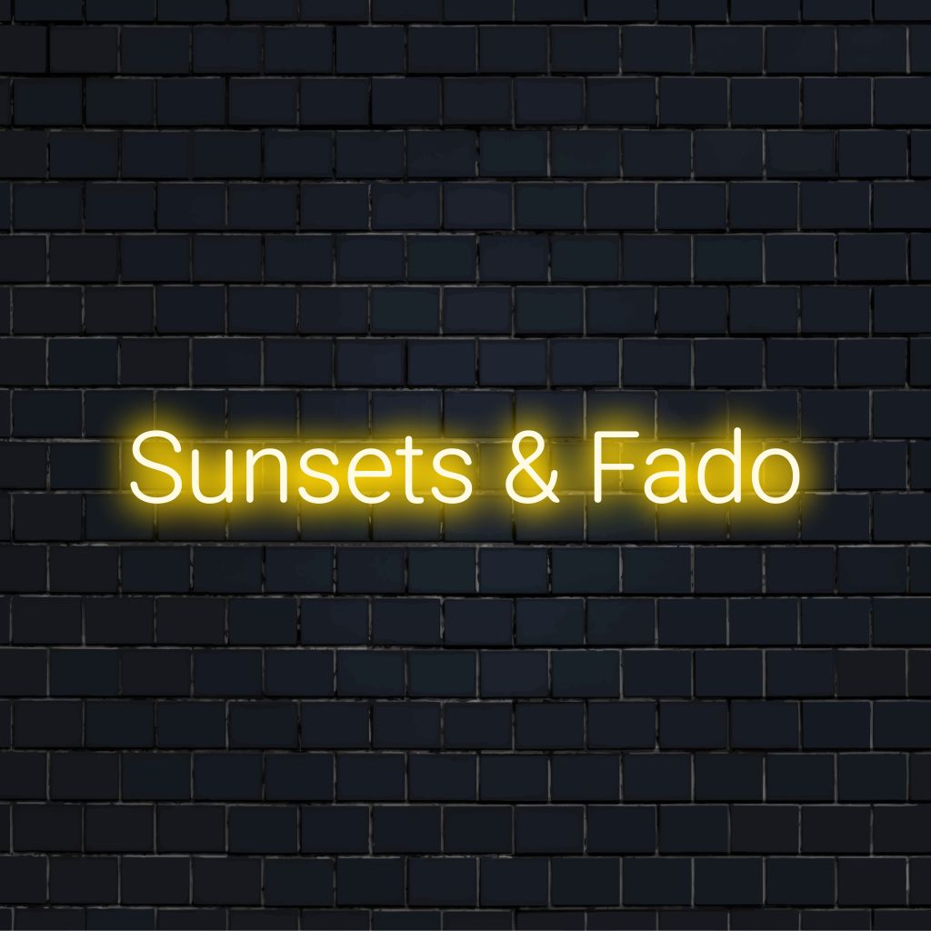 Sunsets Fado Neon Light with glowing lettering on dark brick wall