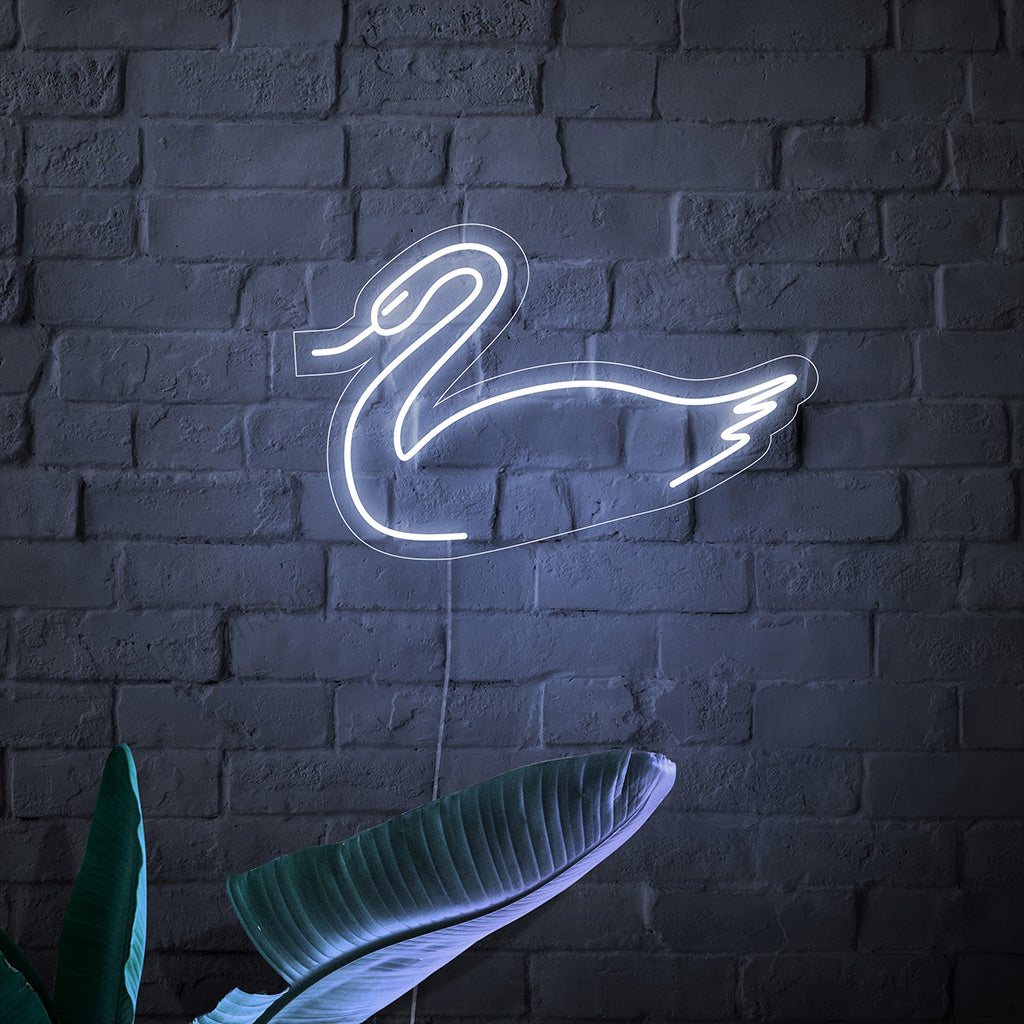 The swan neon sign is an elegant addition to themed decor, emanating a sense of grace and emitting a captivating light.