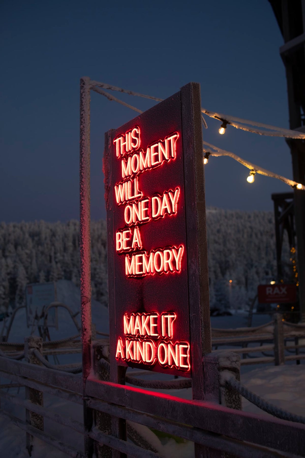 Outdoor LED neon text installation at Ruka Polar Night Light Festival in Finland