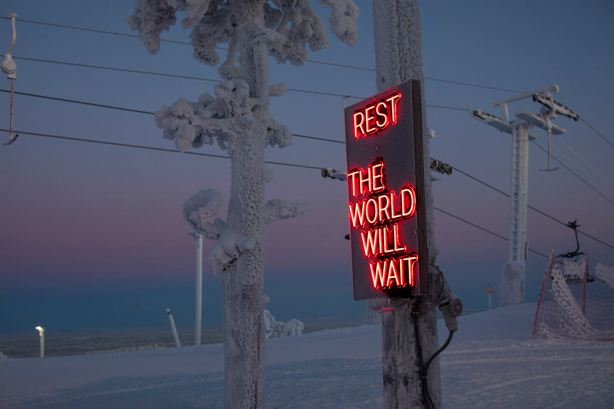 Outdoor LED neon text installation at Ruka Polar Night Light Festival in Finland