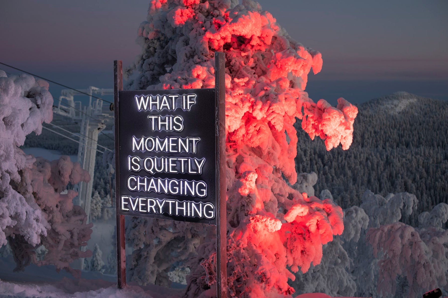 Outdoor LED neon text installation at Ruka Polar Night Light Festival in Finland
