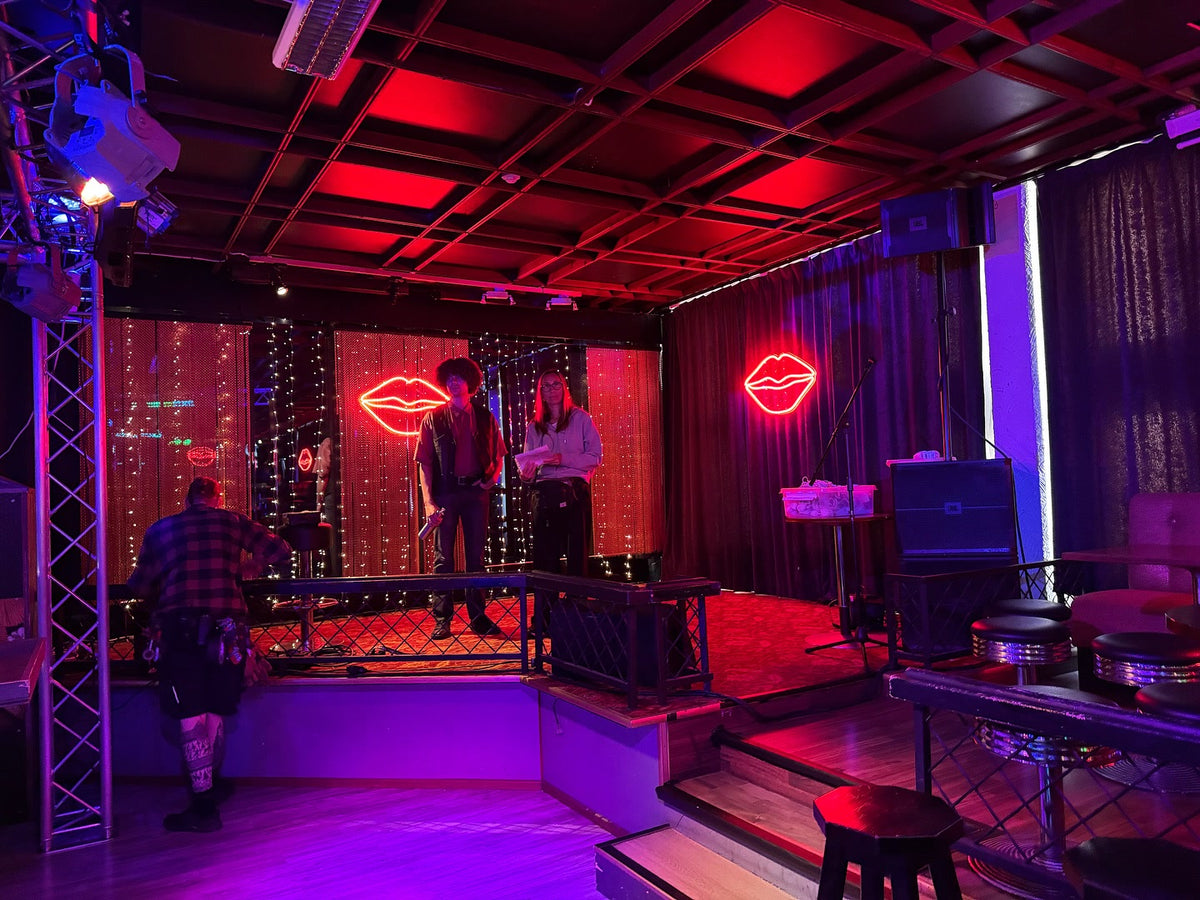 Red lip-shaped LED neon signs used on a Solar Films production set in Finland