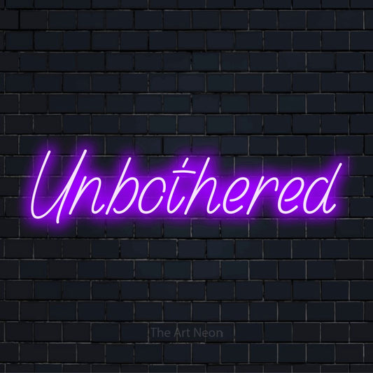 "Unbothered" LED neon sign on a black brick wall
