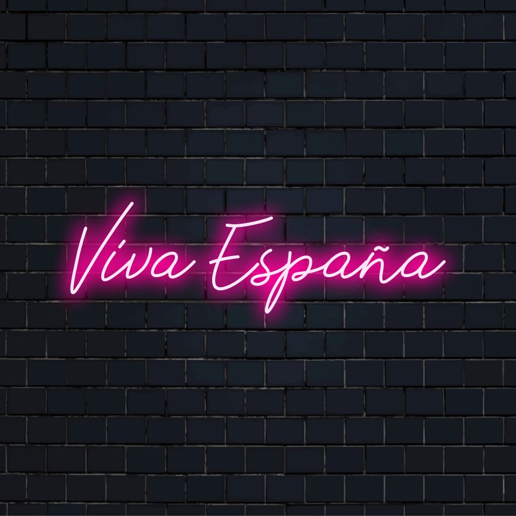 Viva Espana LED Neon Sign, glowing wall decor on dark brick wall