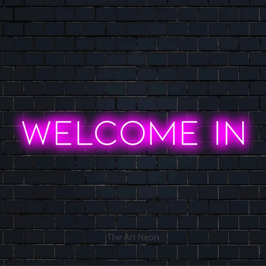 "Welcome In" LED neon sign on a black brick wall