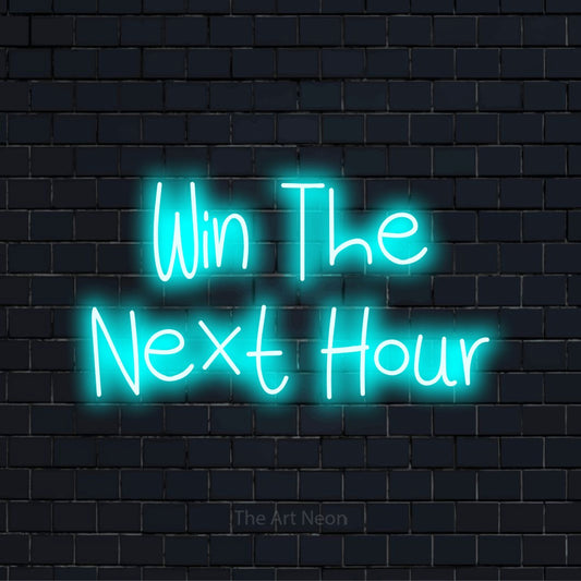 "Win The Next Hour" neon text design on a black brick wall