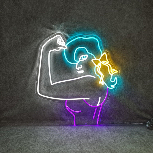 En inspirerande neonskylt som visar upp en kraftfull bild av en kvinna som spänner sina muskler, vilket symboliserar styrka, egenmakt och kondition.