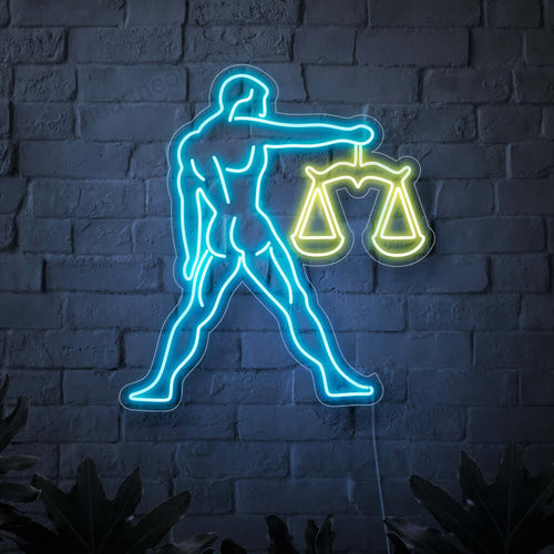 En fängslande neonskylt med symbolen för Vågen, föreställande en man som håller i vågen. Denna neonskylt med astrologitema lägger till en touch av mystik och elegans till alla utrymmen och avger ett levande och förtrollande ljus. Det representerar stjärntecknet Vågen, som symboliserar balans, harmoni och rättvisa.